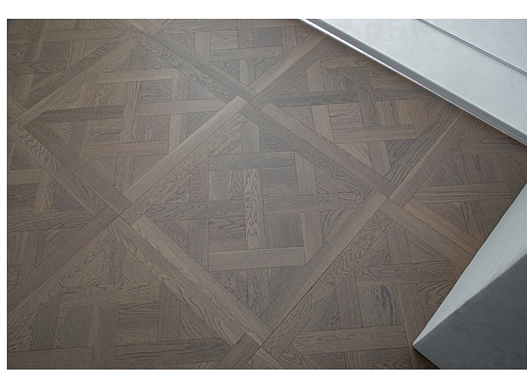 PARBRO 5101 — Oak parquet wood grain close-up detail. Art wood flooring from China, sourced through Tarmeer's Dubai material selection center.