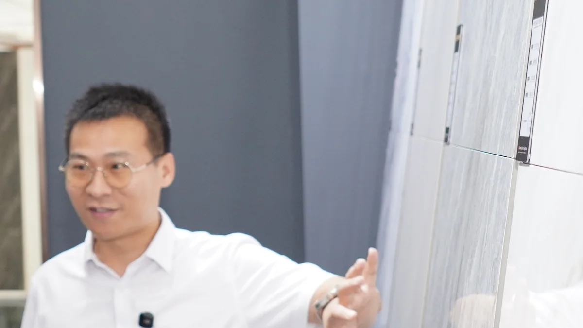 Designers touring a partner factory floor in Foshan